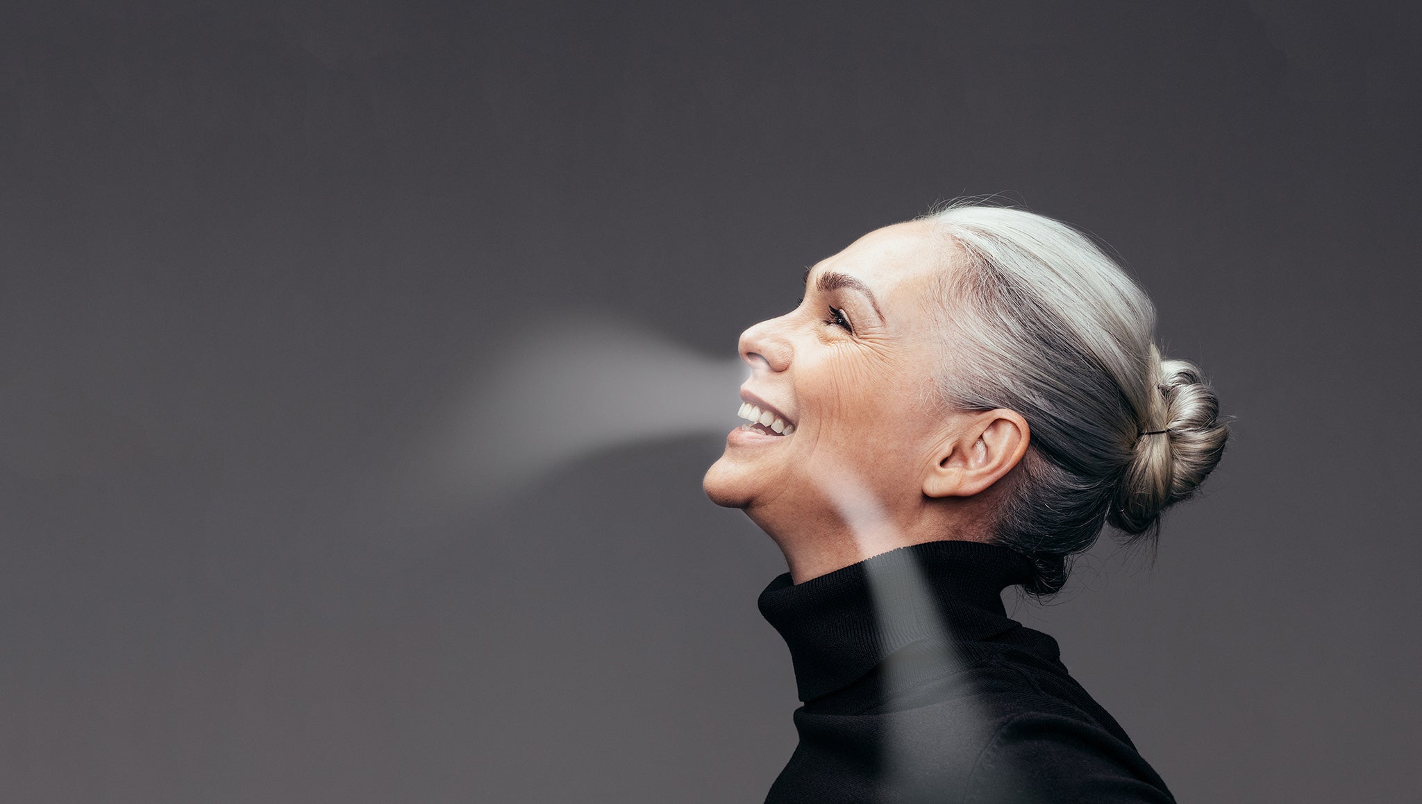 Woman Breathing Fresh Air Smiling